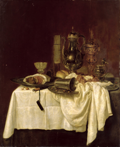 Still life with ham, decanter, columbine cup and passglass on a laid table