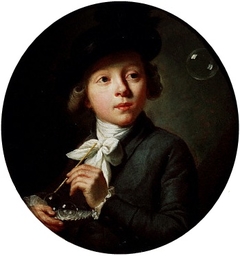 Young Boy Making Soap Bubbles
