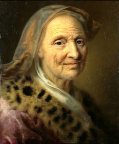 Alte Frau mit goldgelbem Kopftuch