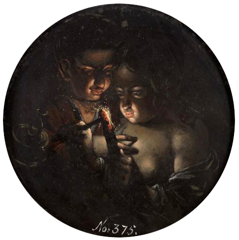 Boy and girl, lighting a candle