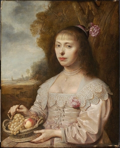 Portrait of a Young Woman Holding a Basket of Fruit
