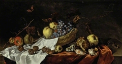 Wicker basket with fruit, medlars and shells